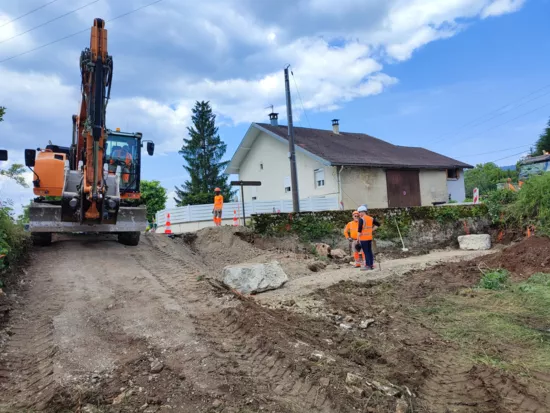 Elargissement du virage d'accès au village